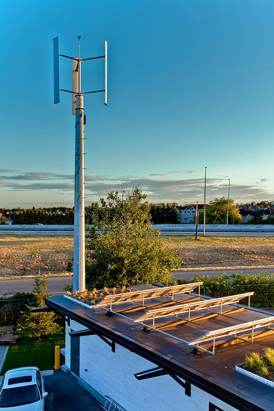 Rooftop wind turbine and solar array at Auto West BMW